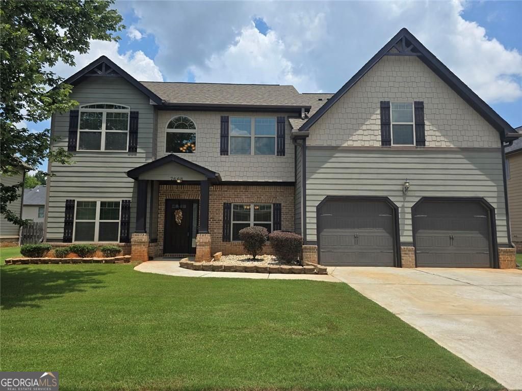 Property Photo:  7668 Wild Cherry Lane  GA 30038 