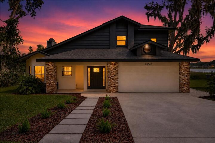Property Photo: 10547 Lakeshore Drive FL 34711