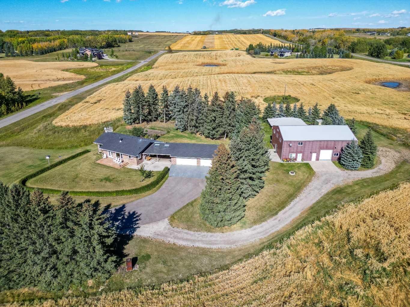 Property Photo: 338076 Meridian Street AB T1S 7B3