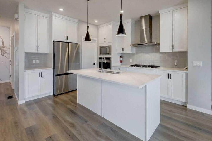 Property Photo: 112 Emberside Place AB T4C 3A8
