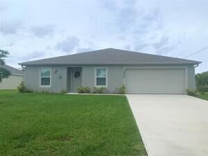 Property Photo: 2033 SW Leafy Road FL 34953