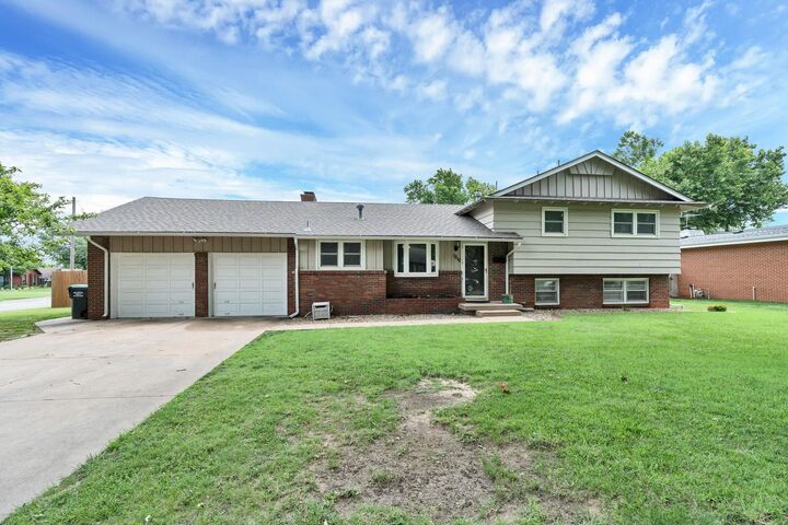 Property Photo:  1210 N Farmstead St  KS 67208 