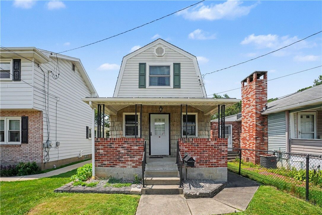 Property Photo:  215 Acme Ave  PA 15024 
