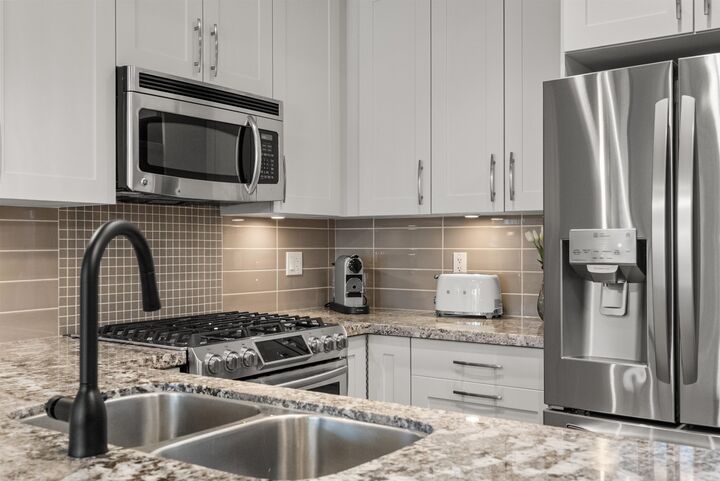 Property Photo: 5099 Springs Boulevard 313 BC V4M 0A2