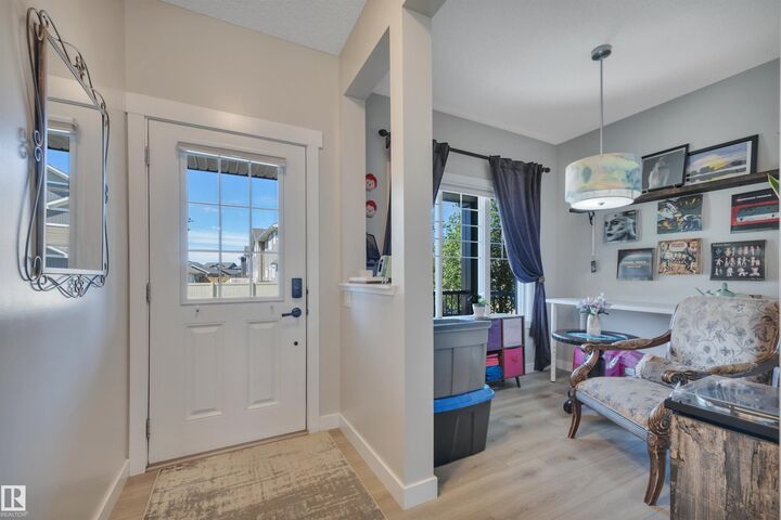 Property Photo: 648 Orchards Boulevard SW AB T6X 2L4