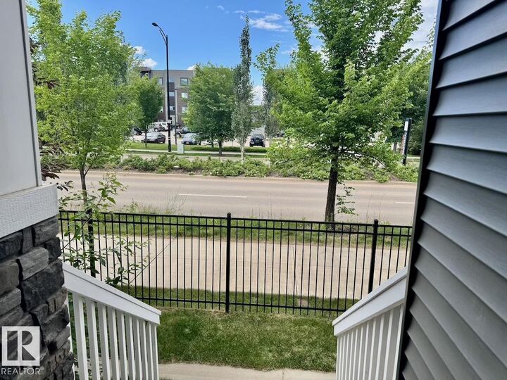 Property Photo: 8209 217 Street NW 56 AB T5T 6Z4