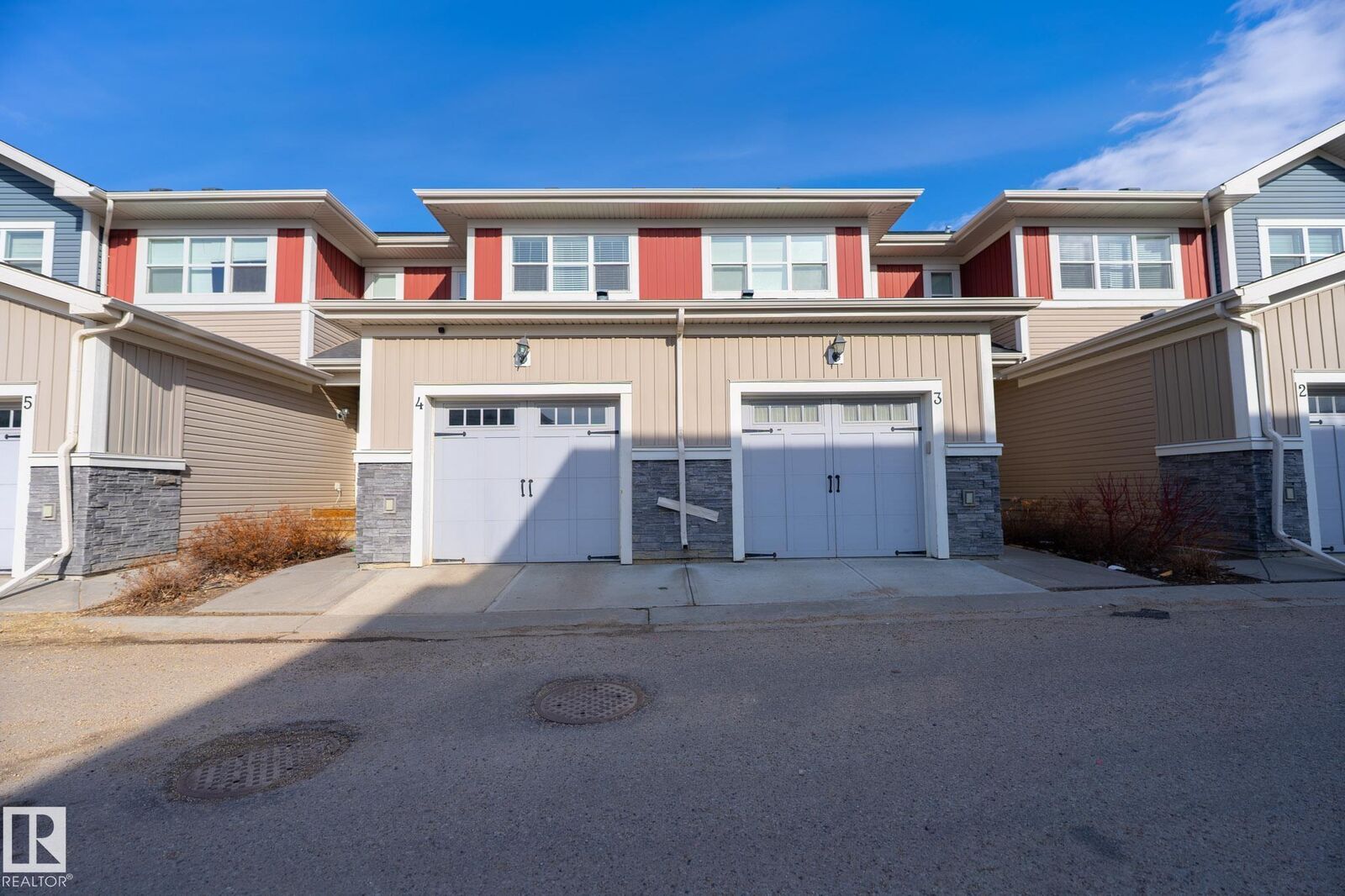 Property Photo: 3710 Allan Drive SW 4 AB T6W 2C4