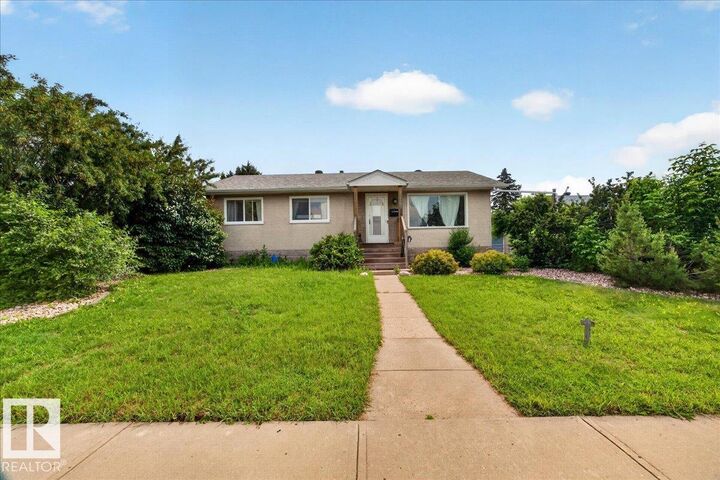 Property Photo:  13307 122 Street NW  AB T5L 0G4 