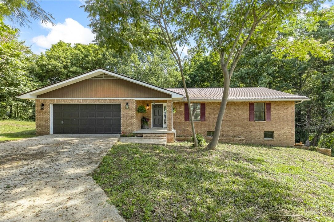 Property Photo:  103 W 74  AR 72641 