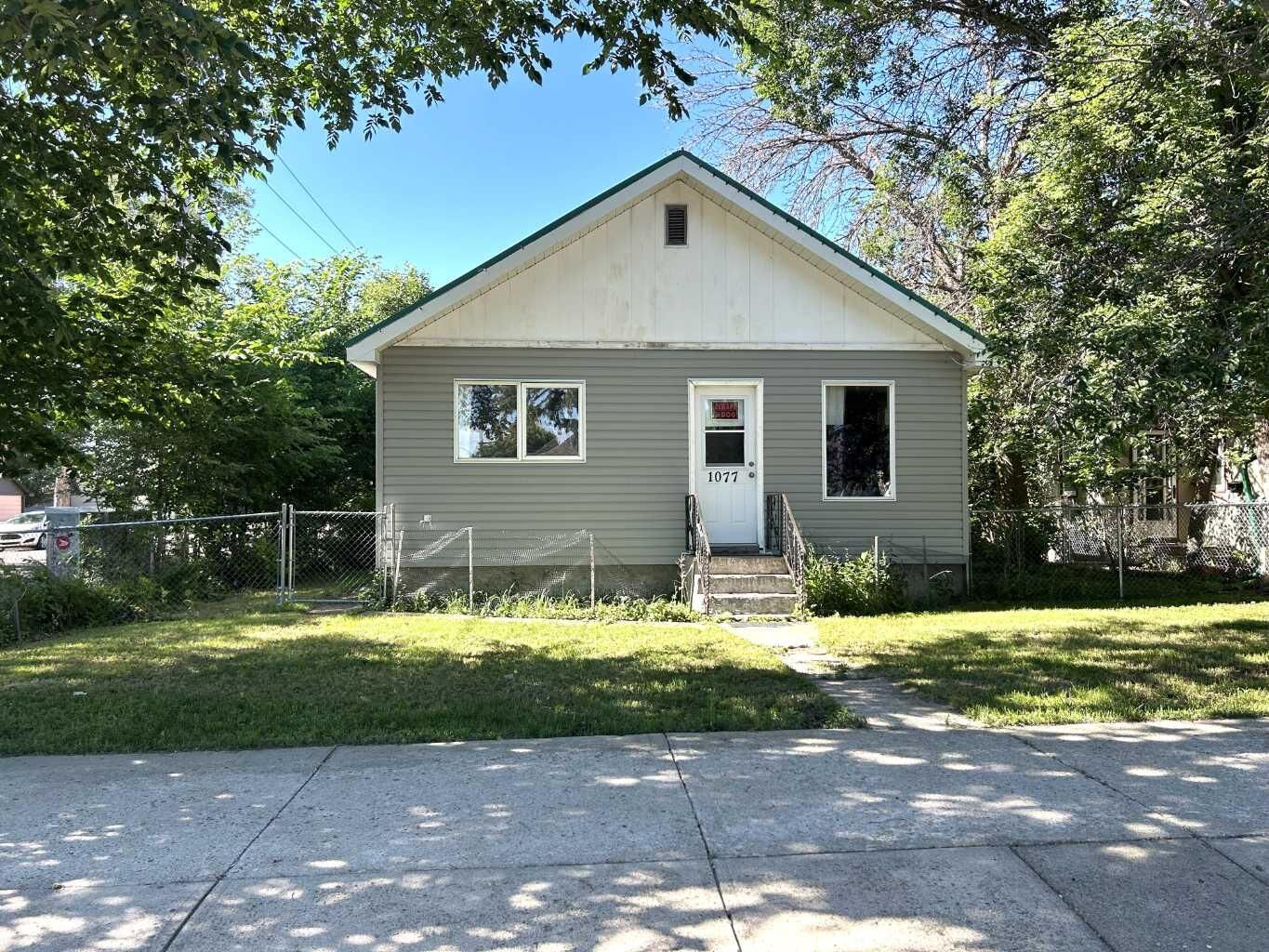 Property Photo: 1077 Braemar Street SE AB T1A 0V9