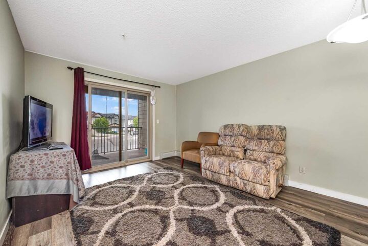 Property Photo: 5 Saddlestone Way NE 207 AB T3J 0S2
