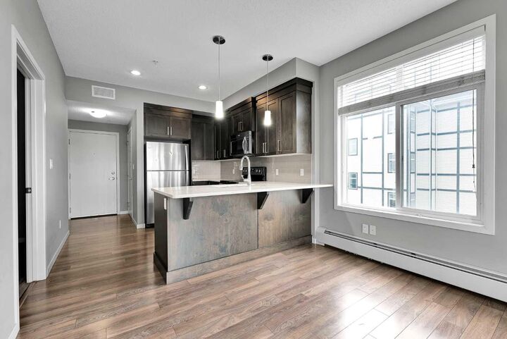 Property Photo: 6703 New Brighton Avenue SE 305 AB T2Z 5C8