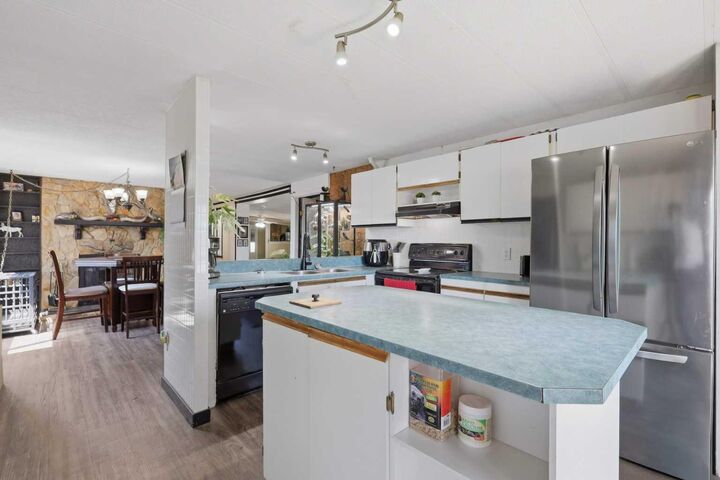 Property Photo: 27 Hearthstone Drive AB T4L 1R2