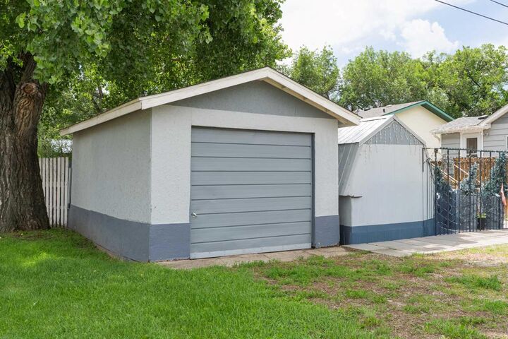 Property Photo:  5123 56 Street  AB T1G 1M8 