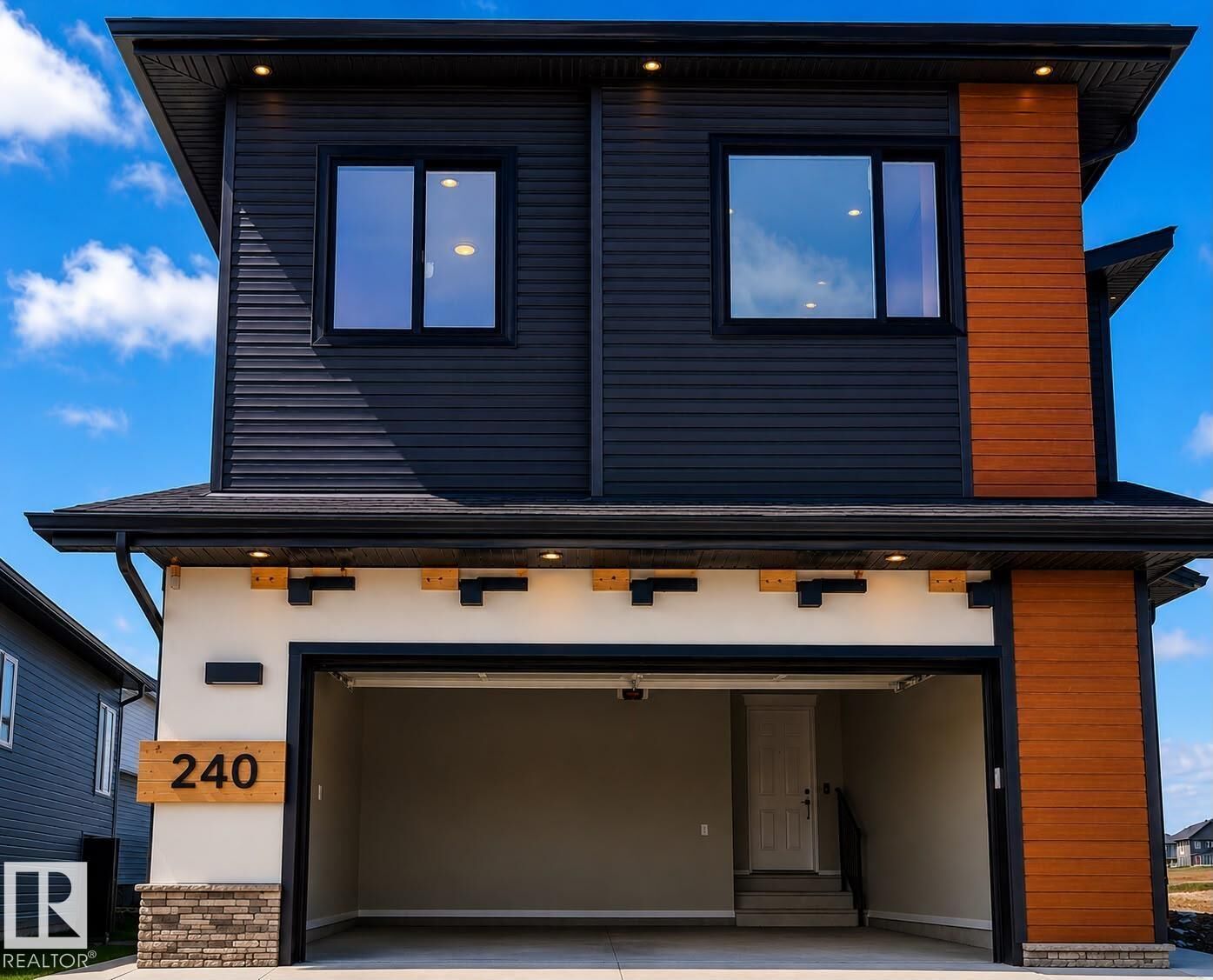 Property Photo:  240 166 Av NE NE  AB T5Y 4J2 