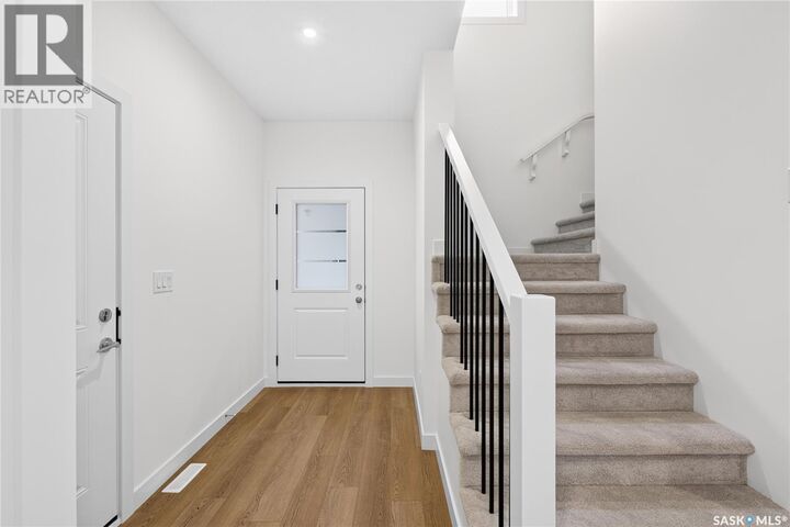 Property Photo:  8 830 Brighton Boulevard  SK S7V 2A8 