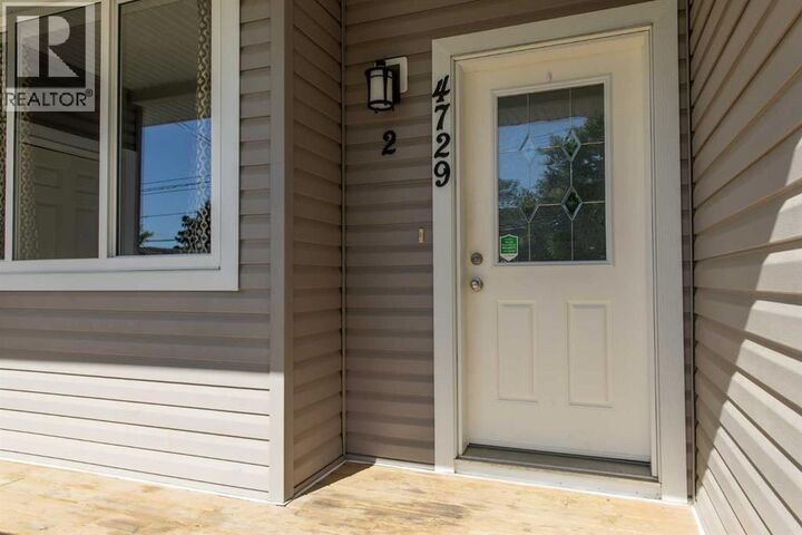 Property Photo: 4729 49 Street AB T7A 1J1