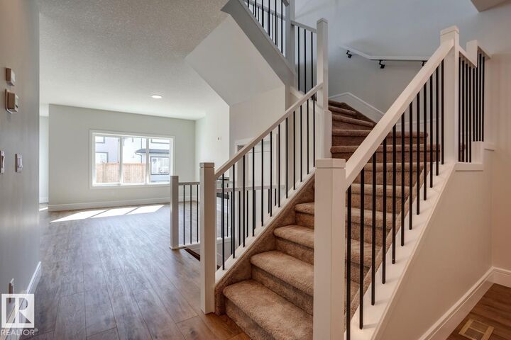 Property Photo: 13 Scoria Wynd AB T8L 0Z1