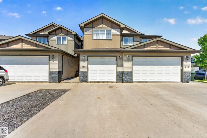 Property Photo: 311 Genesis Vi AB T7Z 0J6