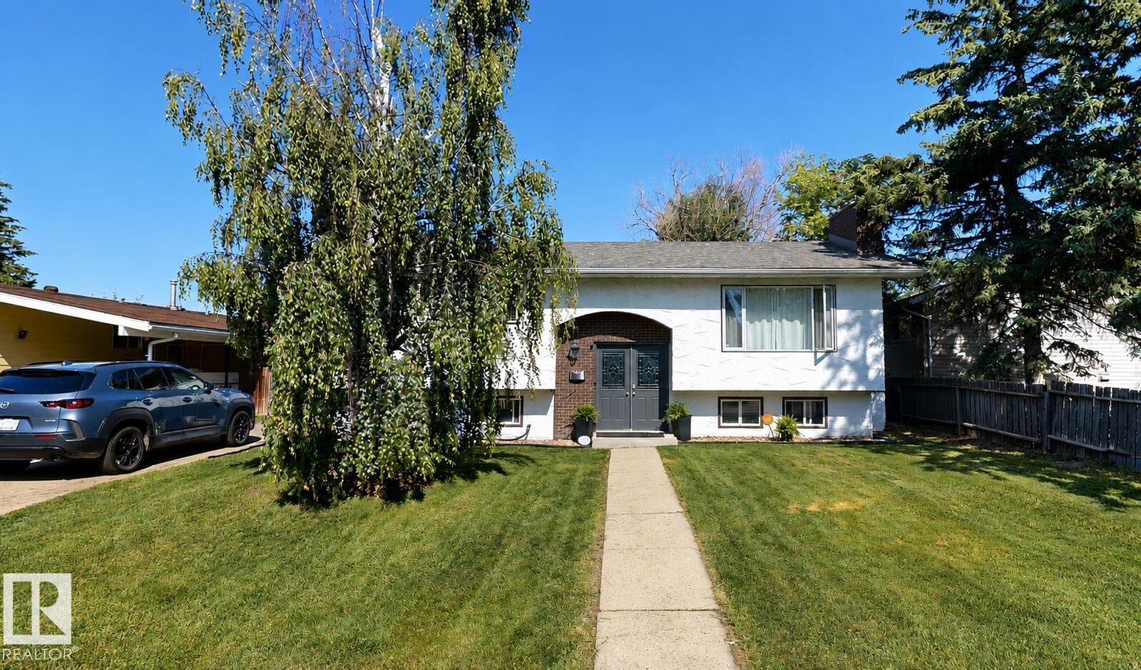 Property Photo:  1112 87 Street NW  AB T6K 1Y1 