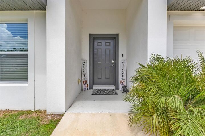 Property Photo:  203 Cayuga Street  FL 33954 