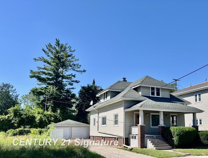 Property Photo:  135 N Bates Street  MI 48602 