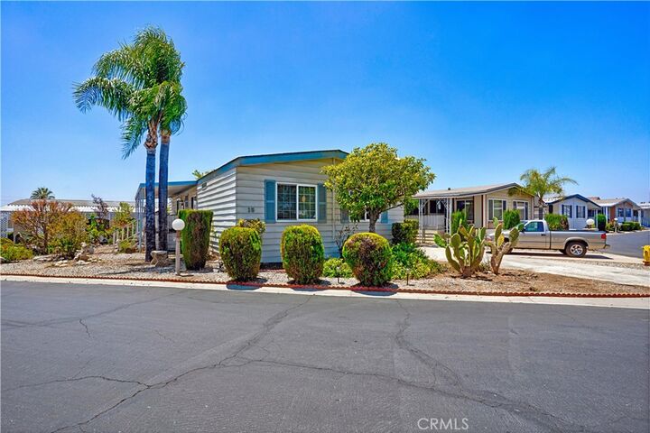 Property Photo:  23820 Ironwood Avenue 15  CA 92557 