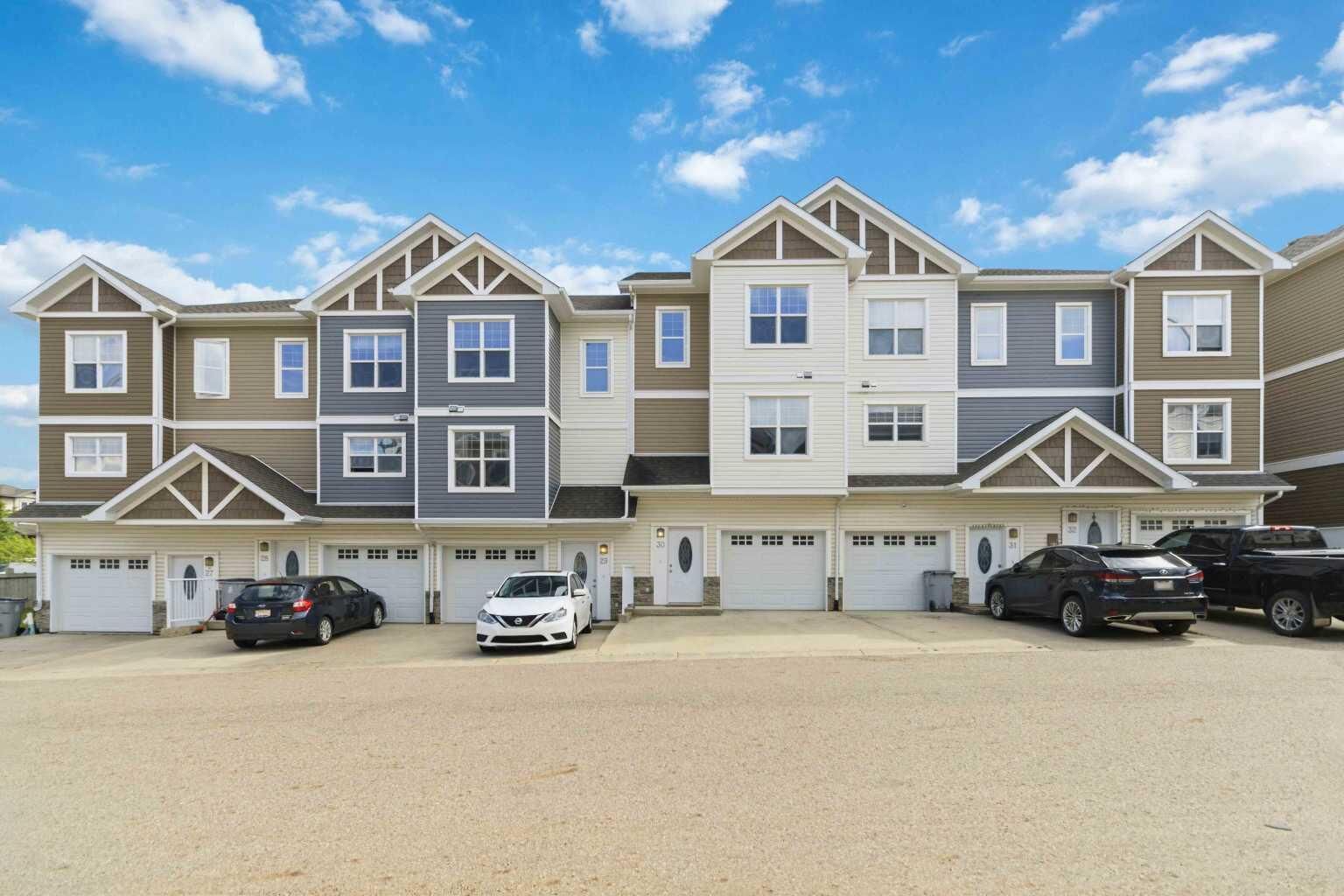 Property Photo:  180 Riverstone Ridge 30  AB T9K 0V6 