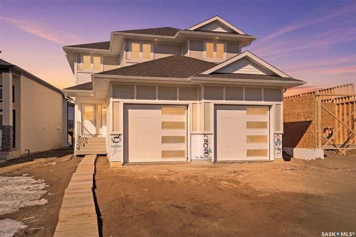 Property Photo: 203 Sharma Lane SK S7W 0Y4