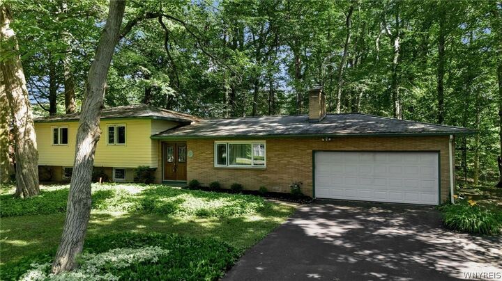 Property Photo:  303 Hilltop Drive  NY 14059 
