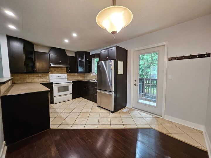 Property Photo:  15118 91A Avenue  BC V3R 6X1 