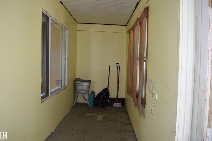 Property Photo:  9551 106A Avenue NW  AB T5H 0S9 