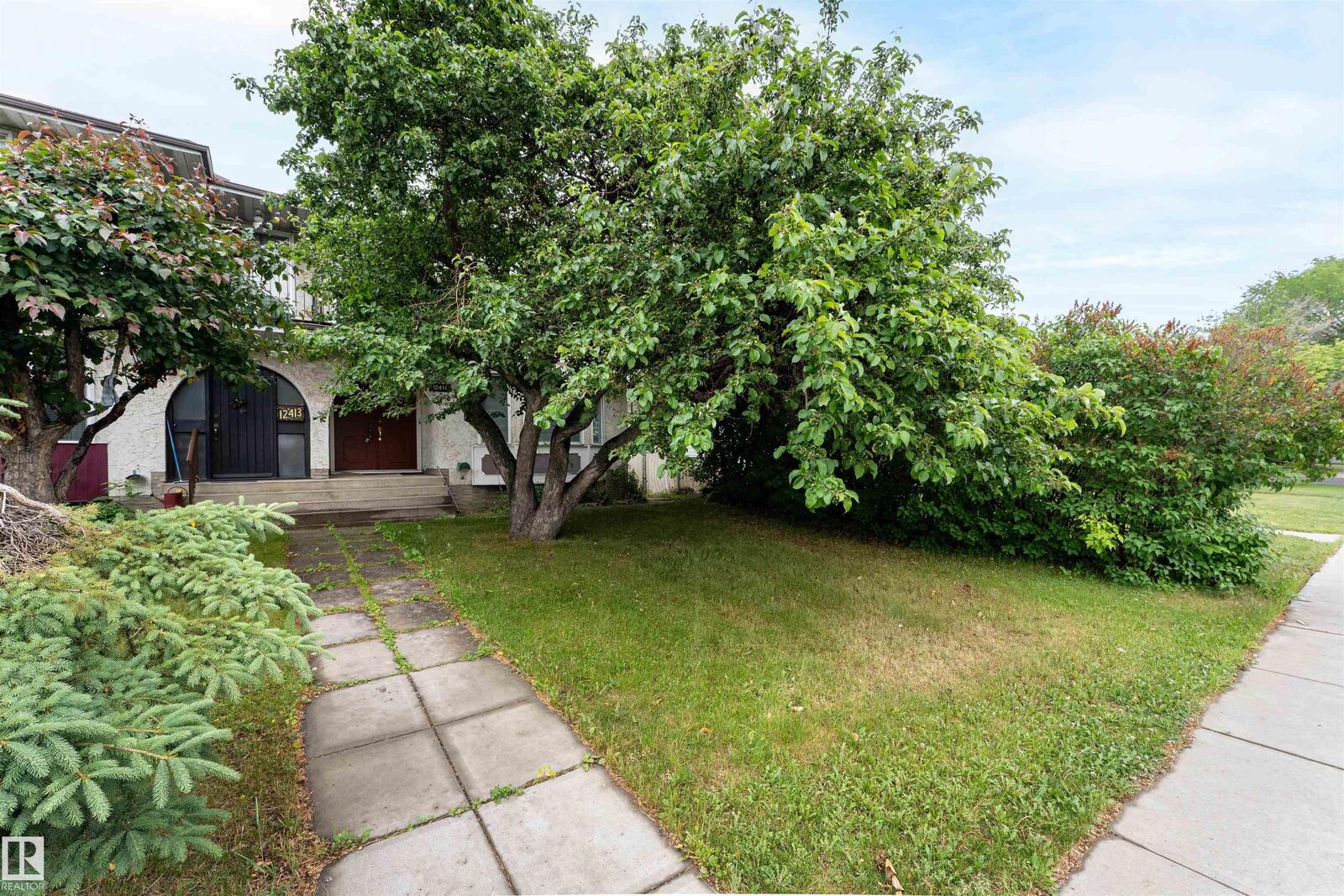 Property Photo:  12411 94 Street NW  AB T5G 1K5 