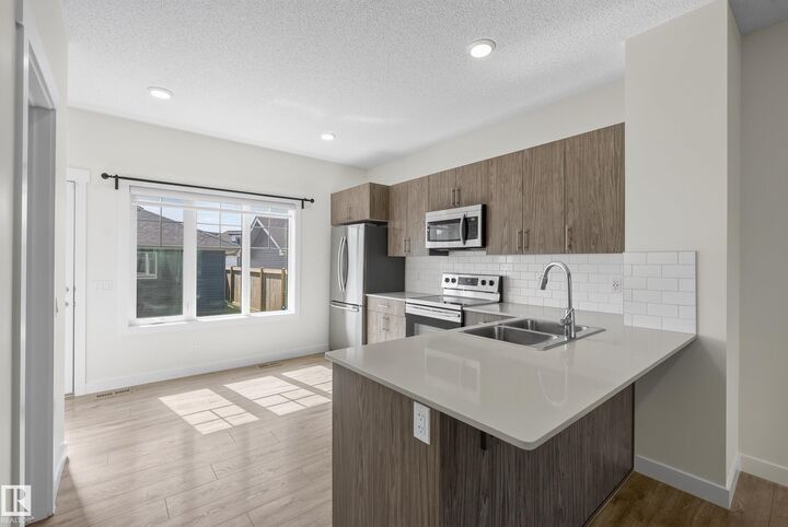 Property Photo:  2707 Orchards Road SW  AB T6X 2M9 