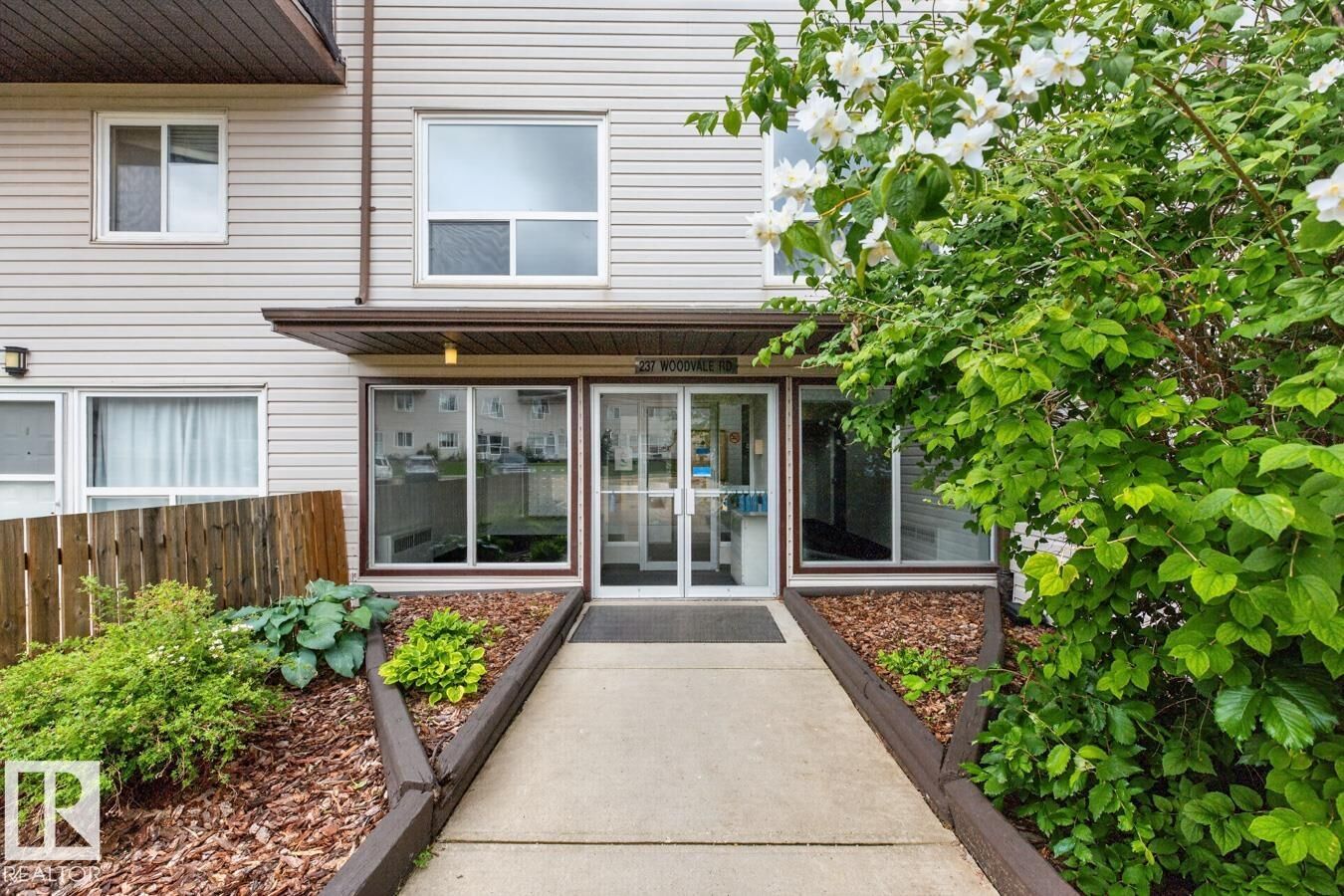 Property Photo: 237 Woodvale Road NW 106 AB T6L 1G7