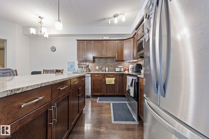 Property Photo: 10530 56 Avenue NW 214 AB T6H 0X7