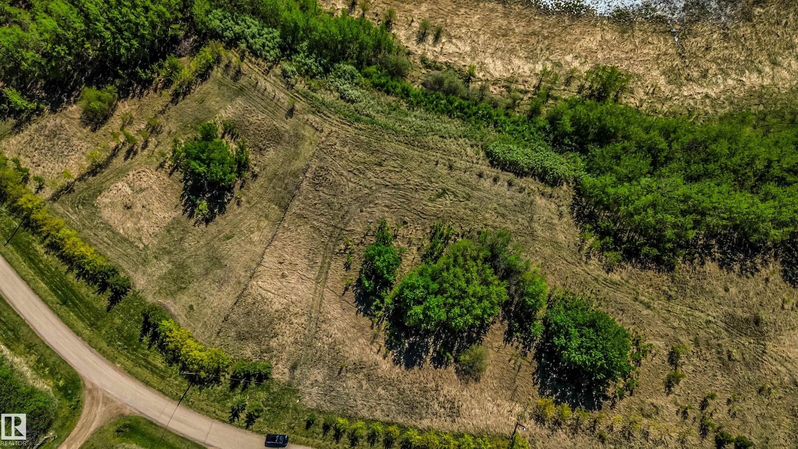 Property Photo:  707 59128 Rng Rd 95  AB T0A 3A0 