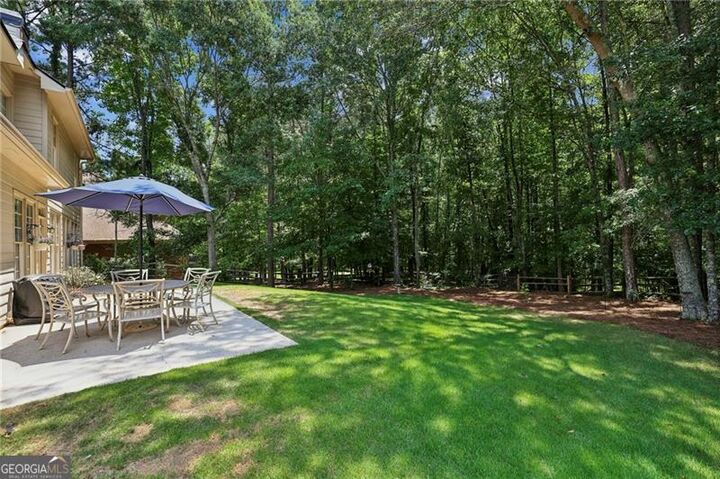 Property Photo:  6930 Olde Atlanta Parkway  GA 30024 