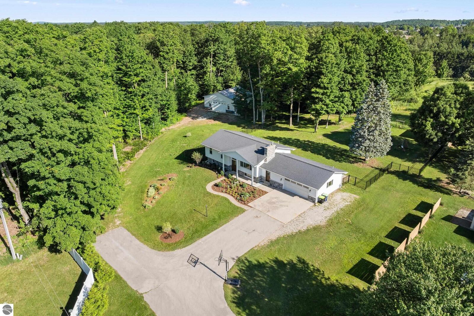 Property Photo:  3733 E Long Lake Road  MI 49685 