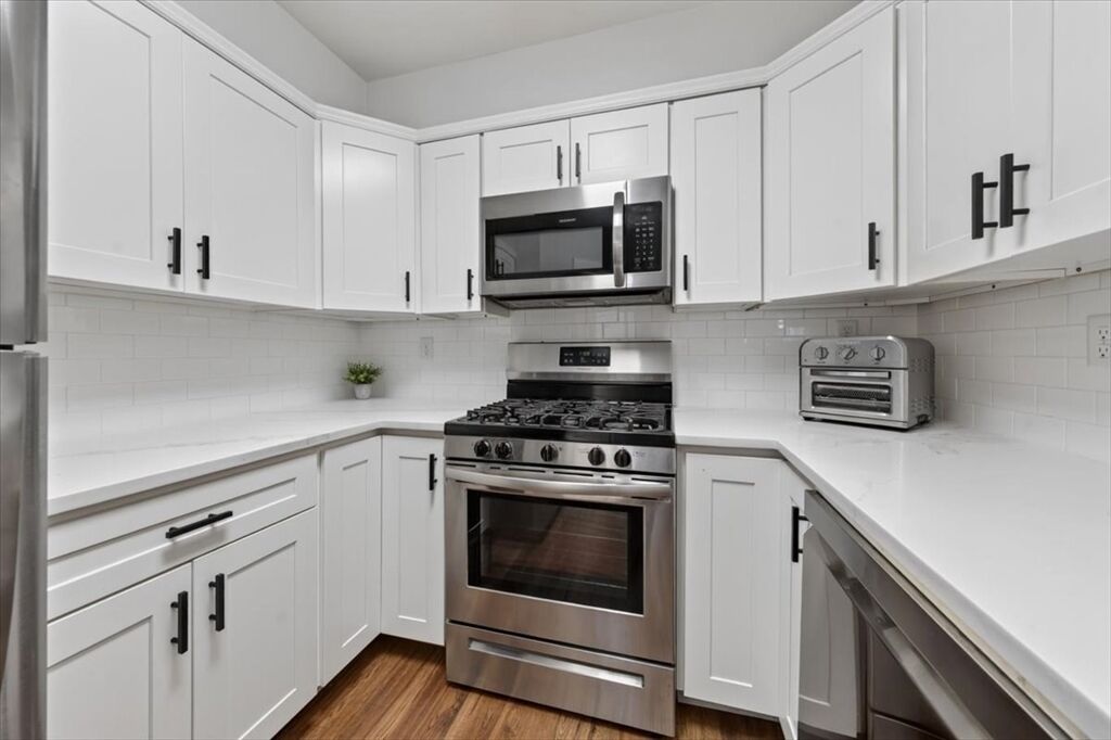 Property Photo: 26 School St. 210 MA 02045