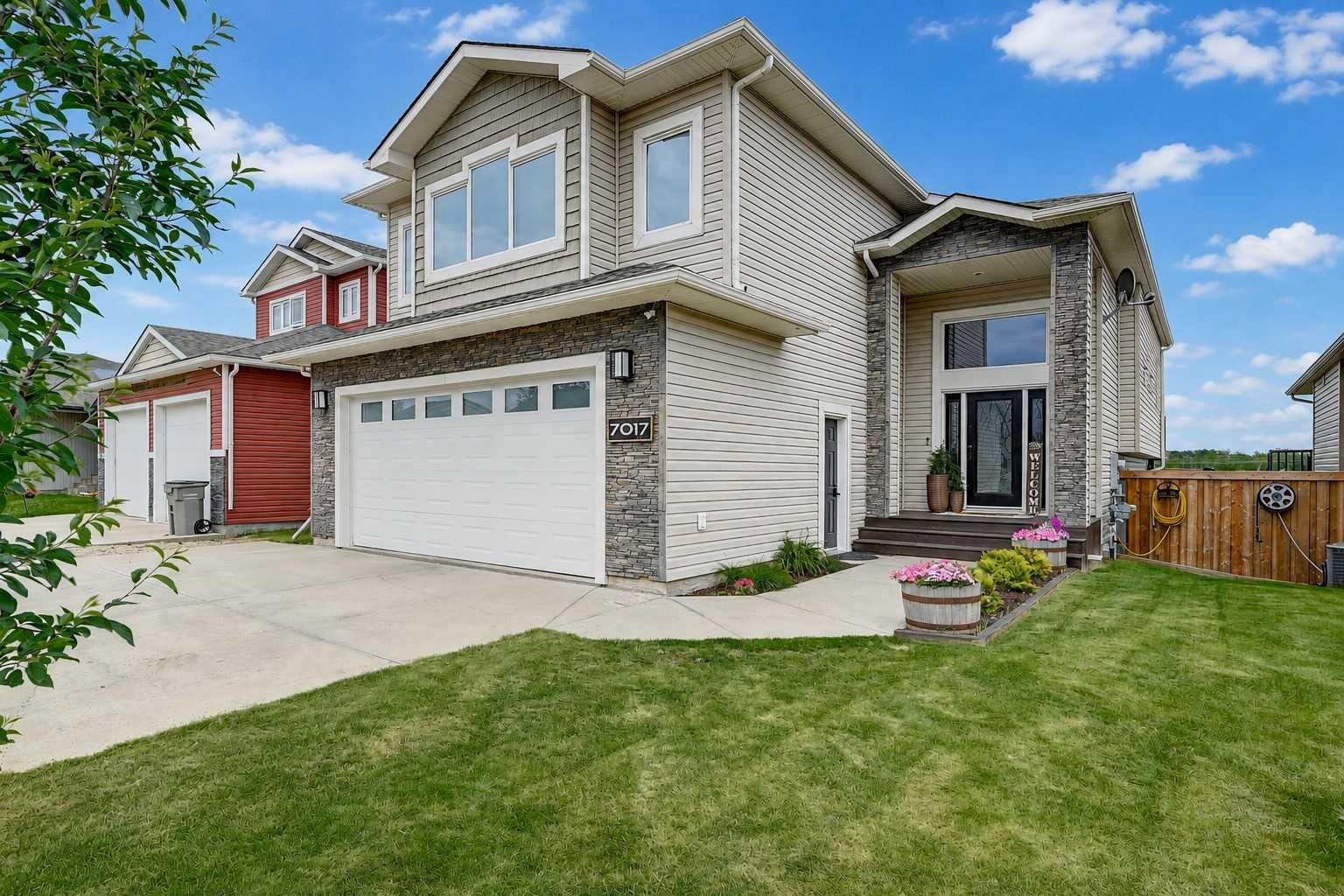 Property Photo: 7017 85 Street AB T8X 0J3