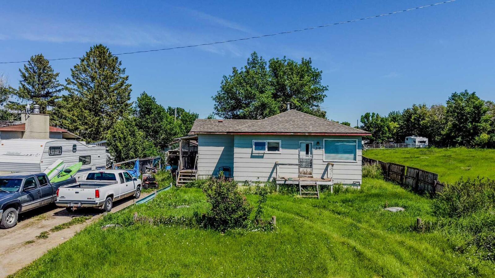 Property Photo: 218 3A Street AB T0K 2E0
