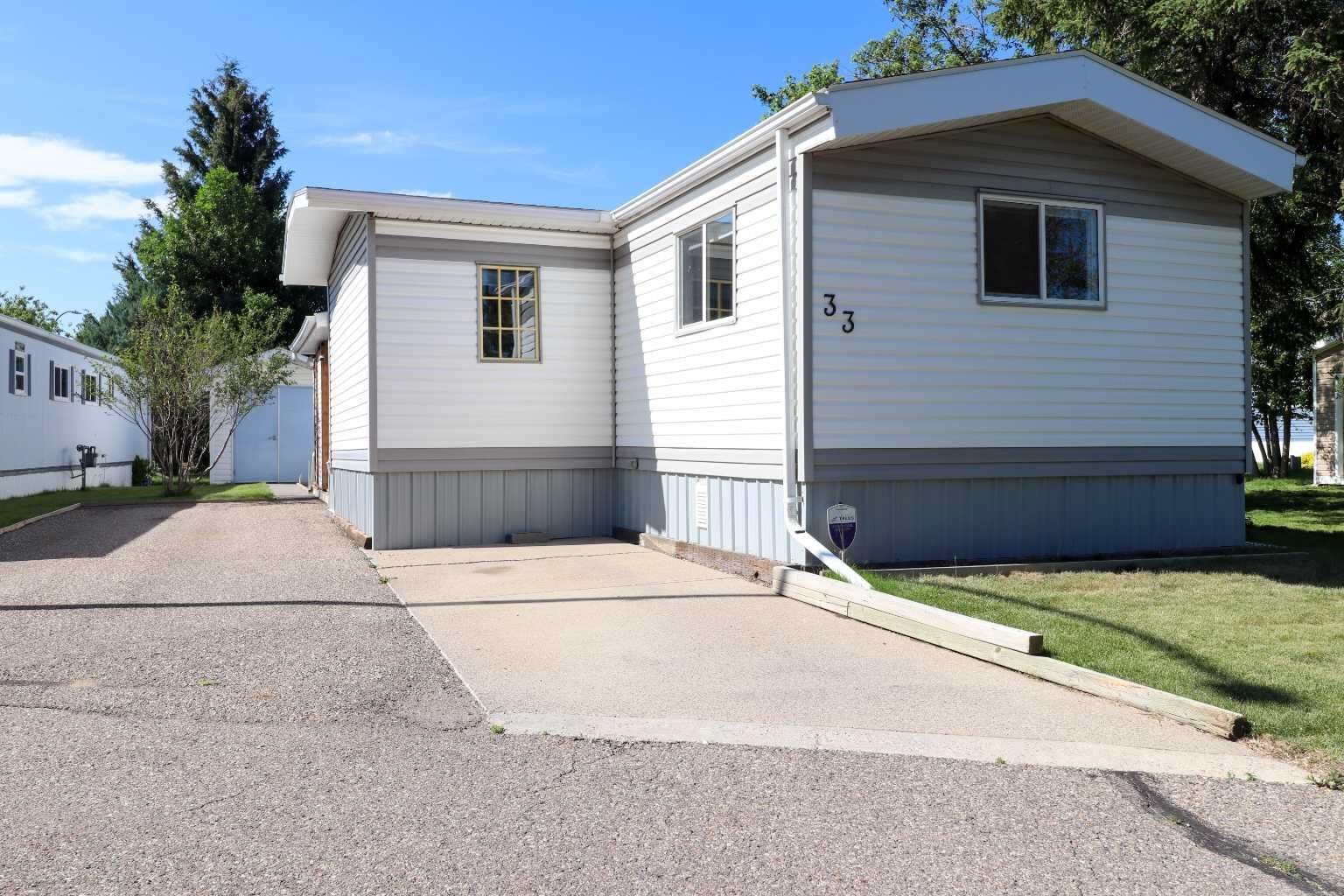 Property Photo:  2300 13 Street N 33  AB T1H 4E8 