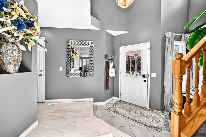 Property Photo:  216 Hidden Spring Green NW  AB T3A 5N4 
