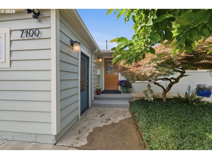 Property Photo: 7100 SE Harrison Ct OR 97215