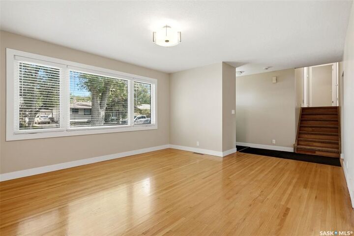 Property Photo:  233 Orchard Crescent  SK S4S 5B9 