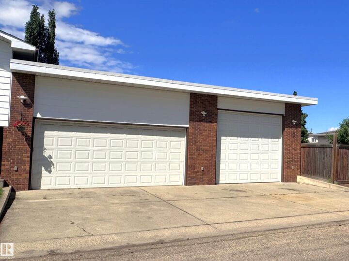 Property Photo:  7312 137 Avenue NW  AB T5C 2L5 