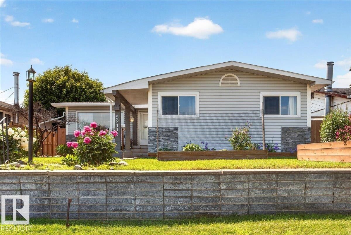 Property Photo: 5211 94A Avenue NW AB T6B 0Y6