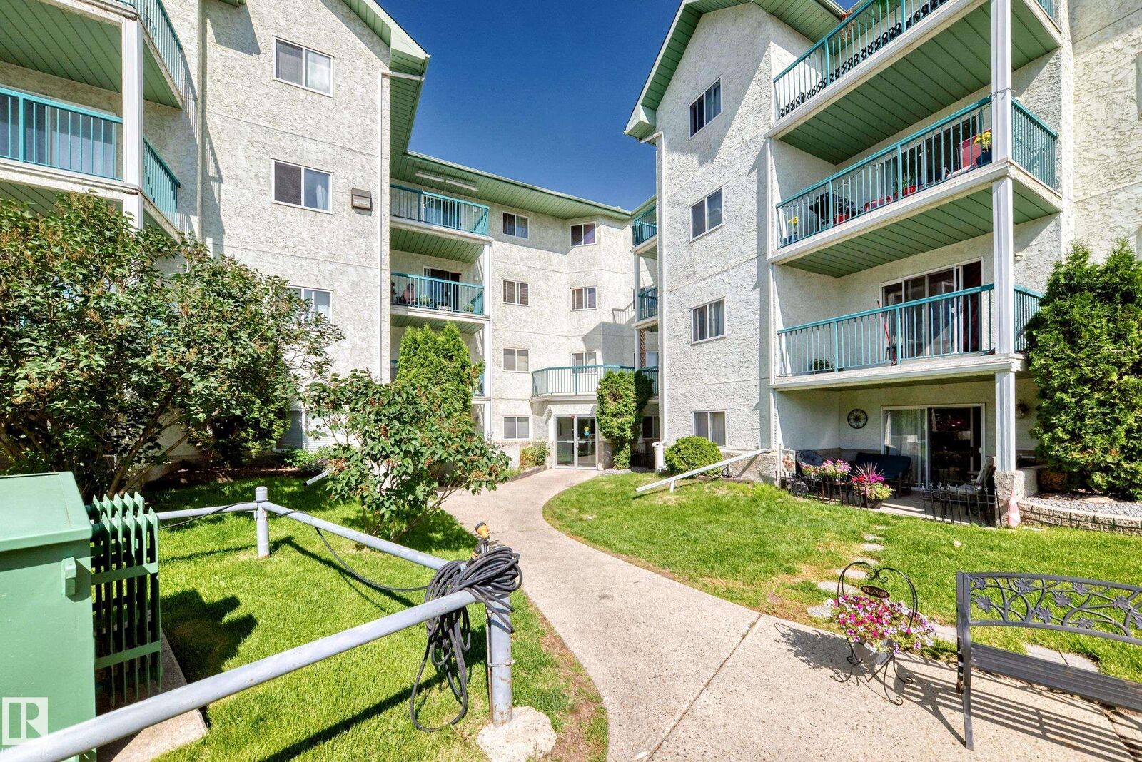 Property Photo: 9619 174 Street NW 208 AB T5T 6C6