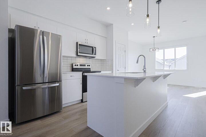 Property Photo: 6343 King Wynd SW AB T6W 5P1